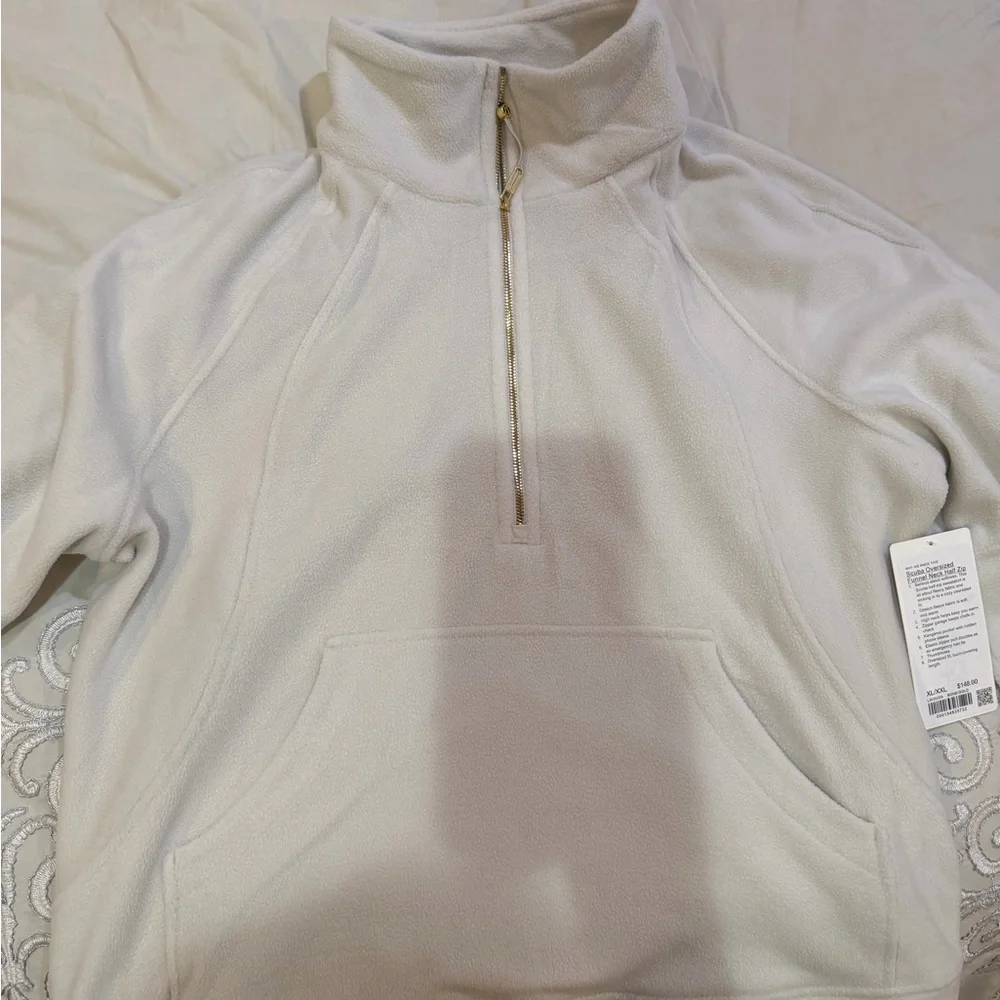 Scuba Tumbled Fleece Funnel-
Neck Half Zip
Colour Bone/Gold
Size XL/XXL - Picture 8 of 10